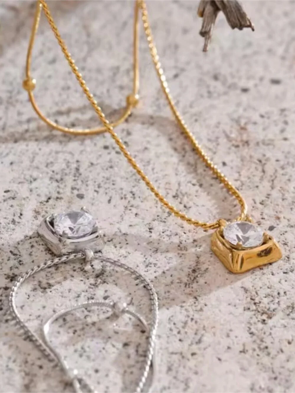 Gold Toned Pendant Necklace with Clear Stone